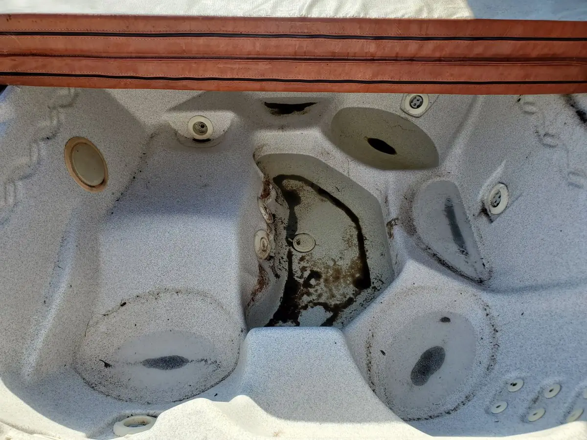 Hot Tub — before pressure washing